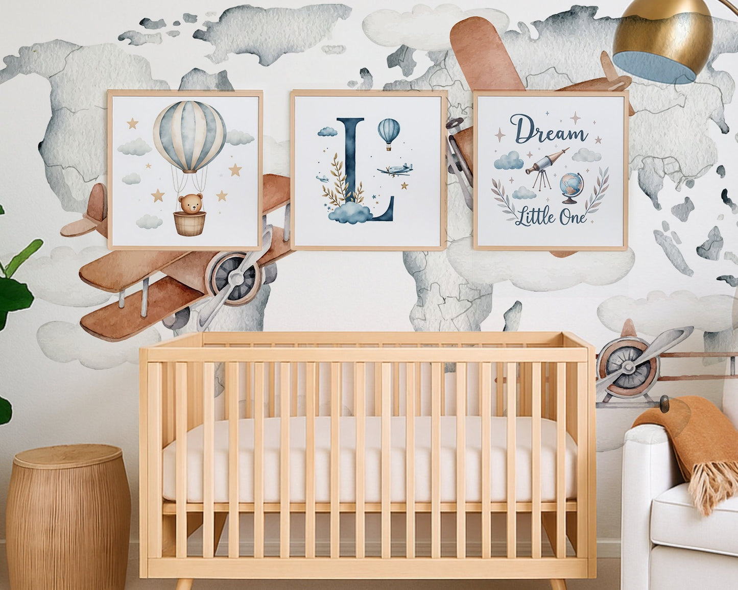 Nursery room with wooden crib, decorative wall art, and airplane propeller design.