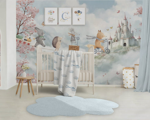Children's room with crib, decorative wall art, and rug.