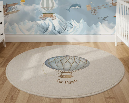Round rug with a hot air balloon design in a nursery setting