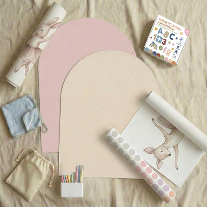Flatlay of Tiny Koala magnetic story wall bundle with pastel arch boards, ballerina deer wall sticker, magnetic letters, chalk pens, and background dot decals
