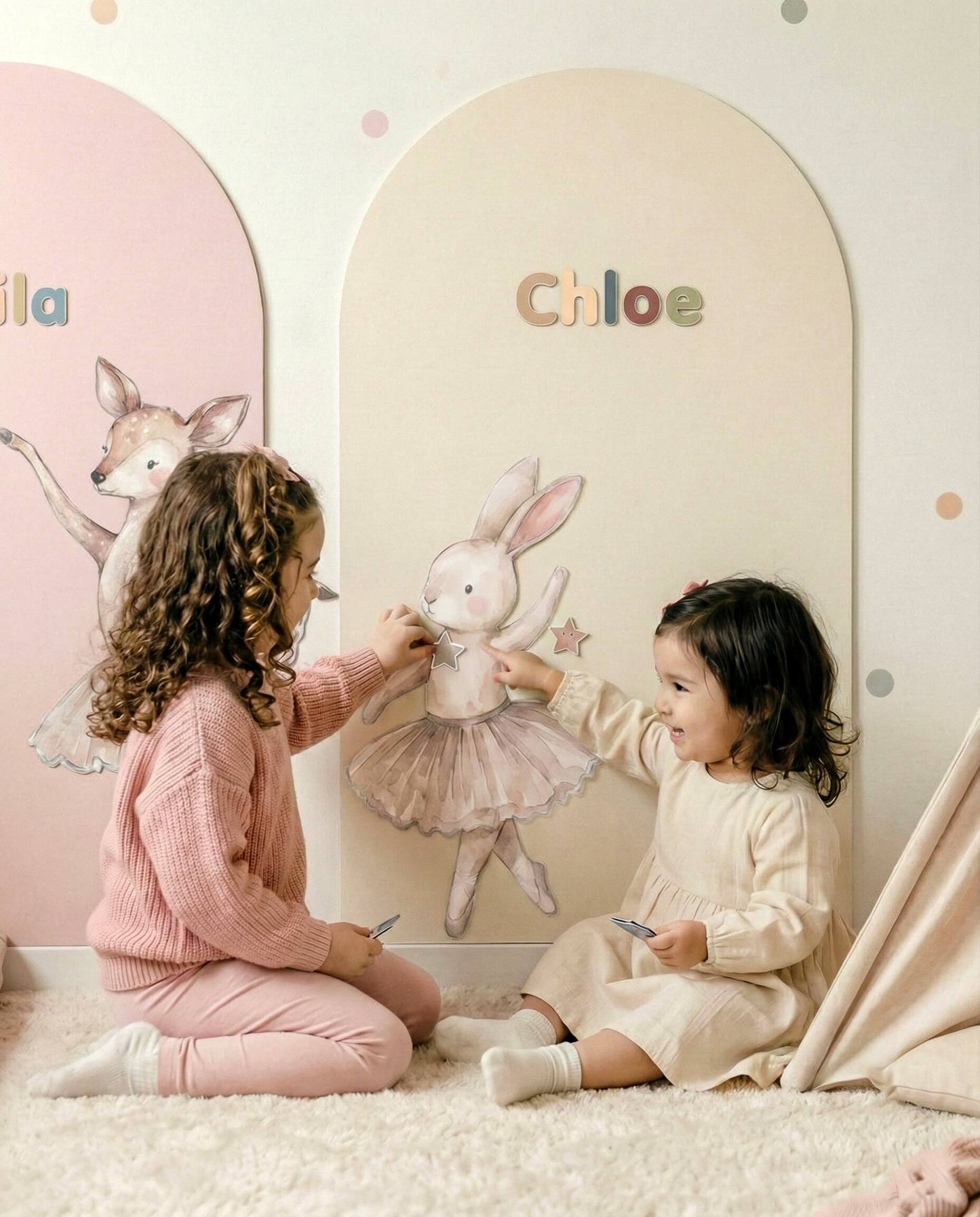 Children playing together on magnetic wall with ballerina wall decals and tactile magnets