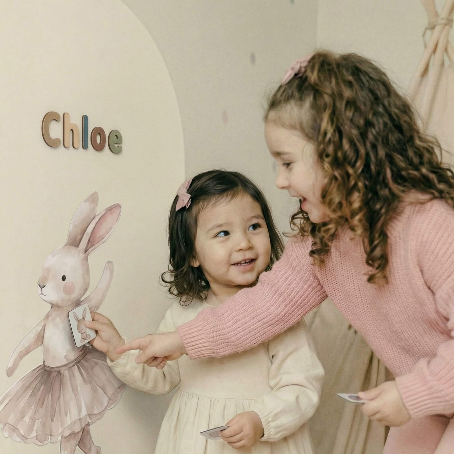 Children playing together on magnetic wall with story character decals and tactile magnets