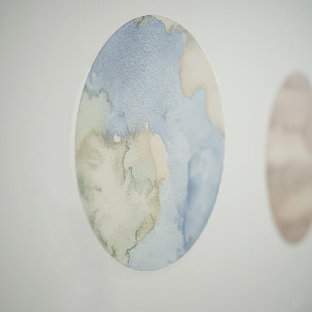 Soft watercolor space planet wall stickers applied to a children’s room wall, creating a calm and dreamy space theme.